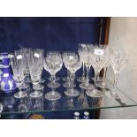 THREE SETS OF SIX CUT-GLASS DRINKING GLASSES