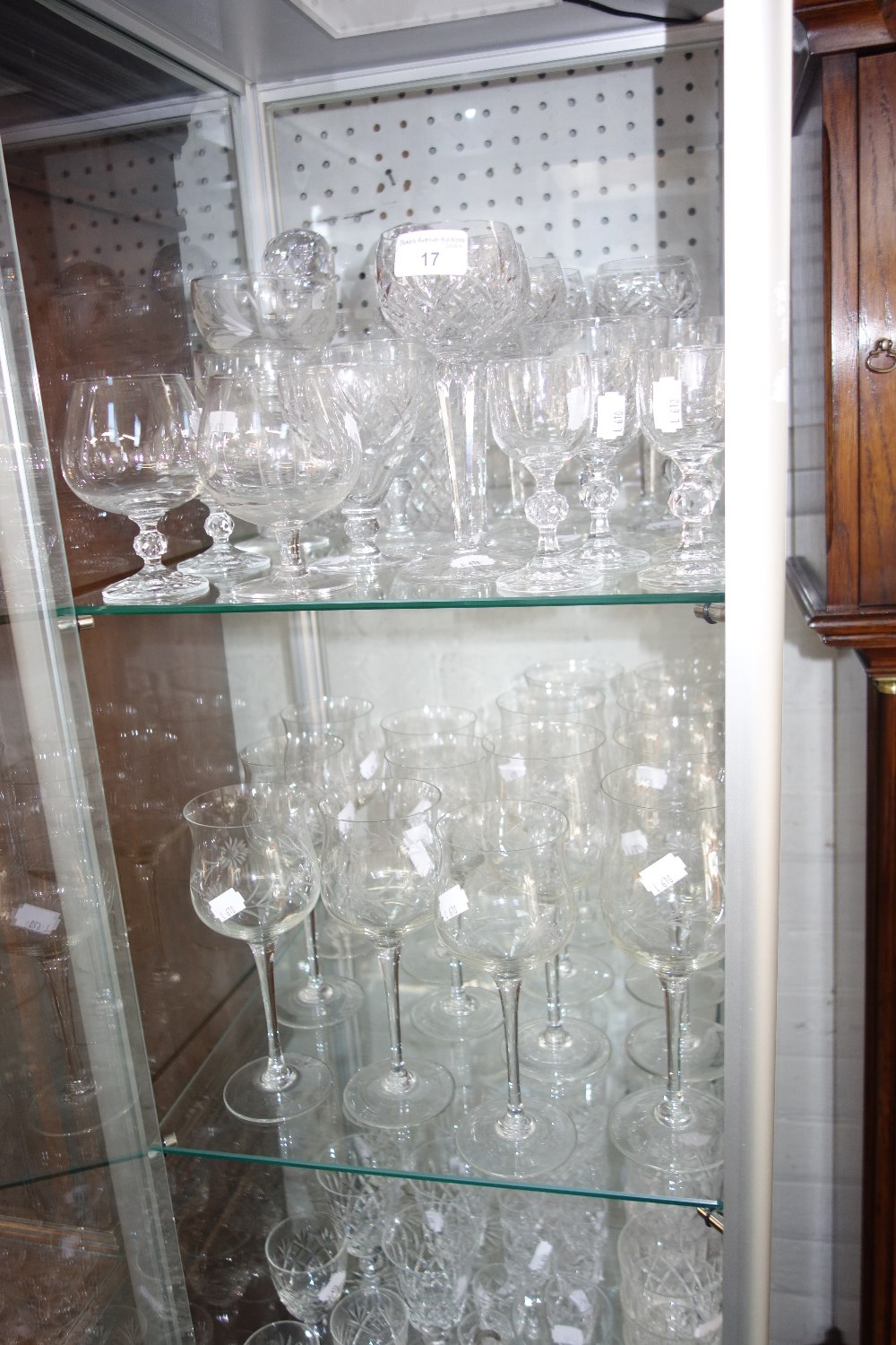 A LARGE COLLECTION OF CUT GLASSWARE including wine and brandy glasses