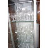 A LARGE COLLECTION OF CUT GLASSWARE including wine and brandy glasses