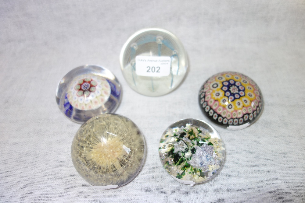 A CAITHNESS GLASS PAPERWEIGHT and others similar