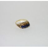 A SAPPHIRE AND DIAMOND DRESS RING, on an 18ct yellow gold shank, ring size O