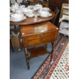 A 19TH CENTURY FRENCH WALNUT BEDSIDE TABLE, fitted two drawers, with a shaped undershelf