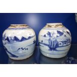A PAIR OF CHINESE BLUE AND WHITE GINGER JARS painted with lake scenes, 16.5 cm high
