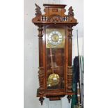 A 19TH CENTURY REGULATOR WALL CLOCK in a walnut case