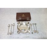 A SILVER ASHTRAY and a collection of unmarked white metal teaspoons