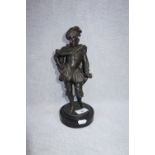 A BRONZE EFFECT STUDY OF AN ELIZABETHAN GENTLEMAN, 28 cm high