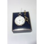 A SILVER OPENFACE POCKET WATCH, the white enamel dial with Roman numerals and floral centre