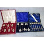 A SET OF SIX SILVER APOSTLE SPOONS in fitted presentation case and two other similar sets