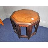A CHINESE HARDWOOD OCTAGONAL LOW TABLE with burwood top, 49" wide