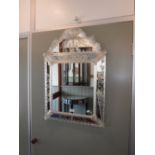 A REPRODUCTION VENETIAN PALAZZO MIRROR, with engraved decoration, 50 cm wide x 73 cm high