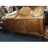 AN EDWARDIAN SIDEBOARD, ON TAPERING LEGS 138 cm wide