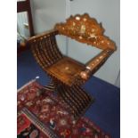 A 19TH CENTURY WALNUT 'SAVONAROLA' CHAIR, with engraved bone inlay, including grotesques and a