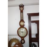 A 19TH CENTURY DIAL BAROMETER in a rosewood case, 94 cm high