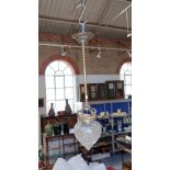 AN EDWARDIAN BRASS HALL LIGHT with brass fittings