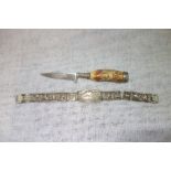 A WHITE METAL SOUVENIR BRACELET 'M. CASSINO-18-V-1944' and a horn handled Solingen knife