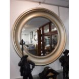 A REGENCY STYLE CIRCULAR WALL MIRROR within a beaded silvered frame, 106 cm dia