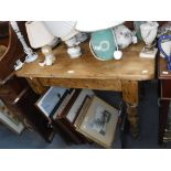 A PINE SCRUBBED-TOP KITCHEN TABLE, ON TURNED LEGS 103 cm x 60 cm