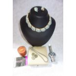 A SILVER FOB CHAIN, a Trifari necklace with earrings, a collection of costume jewellery and a