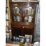 A LATE VICTORIAN MAHOGANY LIBRARY BOOKCASE, with glazed doors above a cupboard, 109 cm wide