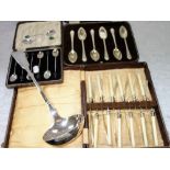 A SET OF SIX SILVER COFFEE SPOONS, in fitted presentation case and a collection of plated cutlery