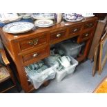 A CHINESE ELM WRITING TABLE, fitted a variety of drawers, 120 cm wide