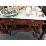 A VICTORIAN STAINED PINE MARBLE TOPPED WASHSTAND with tiled splashback