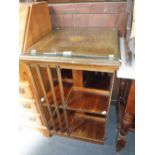 A MAHOGANY REVOLVING BOOKCASE with fan inlay 48 cm wide