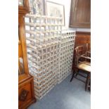 A SIXTY BOTTLE WINE RACK and two others similar (3)