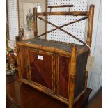 A VICTORIAN BAMBOO WALL CABINET 56 cm high,