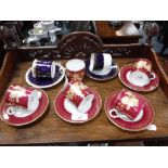 A COLLECTION OF WEDGWOOD COFFEE CANS and saucers