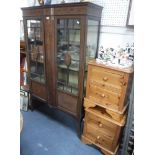 A PAIR OF REPRODUCTION PINE BEDSIDE CHESTS, 48 cms wide and an Edwardian mahogany china cabinet, 106