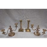 A PAIR OF SILVER PLATED SQUAT CANDELABRA and a pair of plated Corinthian column candlesticks