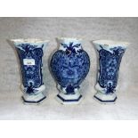 A PAIR OF DELFT TIN GLAZED VASES, 23 cm high and another similar, 24 cm high (3)