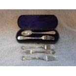 A SILVER DESSERT SPOON AND FORK in fitted presentation case and three other loose forks, approx. 4.