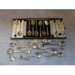 A COLLECTION OF SILVER AND PLATED SPOONS