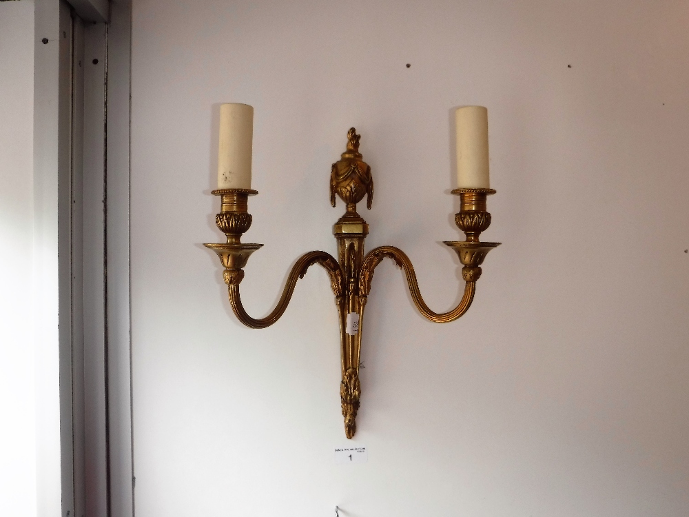 THREE BRASS WALL LIGHTS of Classical form and a similar pair (5) purchased from W Sitch & Co