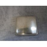 A SILVER CIGARETTE CASE