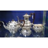 A FOUR PIECE SILVER PLATED ROCOCO TEASET