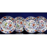 A SET OF FOUR 19TH CENTURY "STONE CHINA" PLATES decorated parrots and flowers