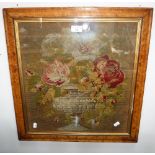 A VICTORIAN NEEDLEWORK of a vase of flowers, in a maple frame, 54 cm high