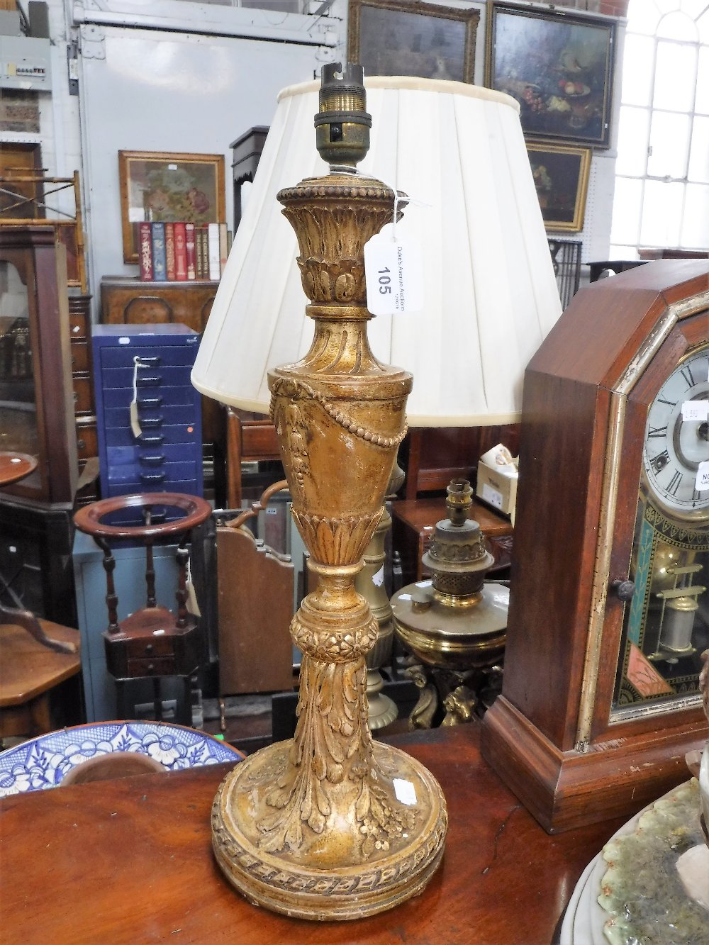 A GILTWOOD TABLE LAMP