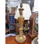 A GILTWOOD TABLE LAMP