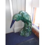 A LARGE ORIENTAL STYLE GREEN GLAZED POTTERY GARDEN HERON, 70 cm high