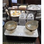 A PAIR OF 19TH CENTURY SCALES with a white marble top and shaped horn bowls and an Edwardian oak