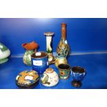 GOUDA; A SMALL LIDDED POT, a bottle vase and a small pot together with a collection of Torquay ware