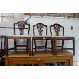 THREE MAHOGANY HEPPLEWHITE STYLE DINING CHAIRS, with drop-in seats