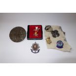 A COLLECTION OF BADGES to include an enamel "Coldstream Guards" badge and "Lucitania" medal