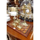 AN EDWARDIAN PARQUETRY TRAY and two pairs of brass candlesticks
