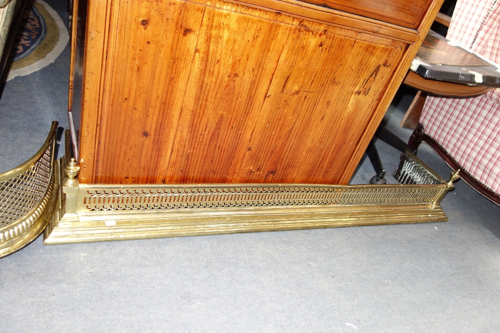 A REGENCY PIERCED BRASS FENDER, 112 cm wide and another similar, 142 cm wide - Image 2 of 2