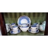 A 19TH CENTURY ROCKINGHAM STYLE BLUE AND GILT PART-TEASET and similar teaware